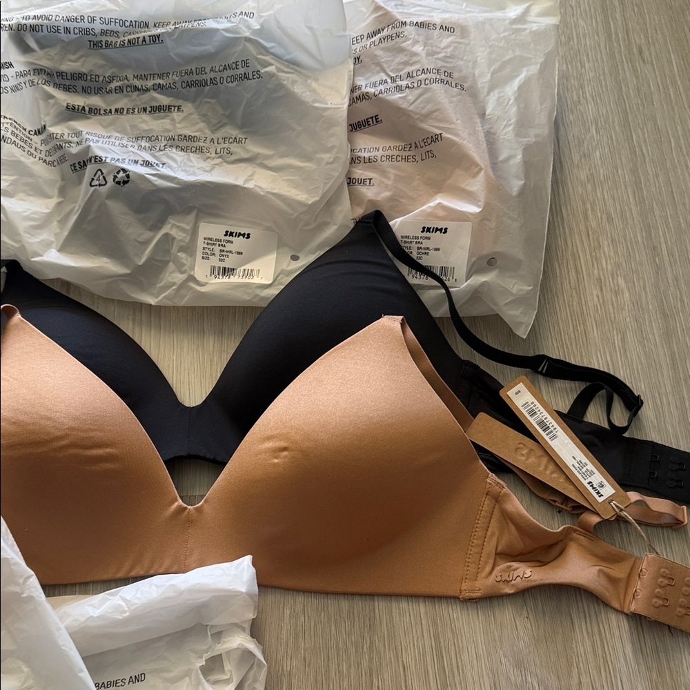 SKIMS Black and Tan Bras